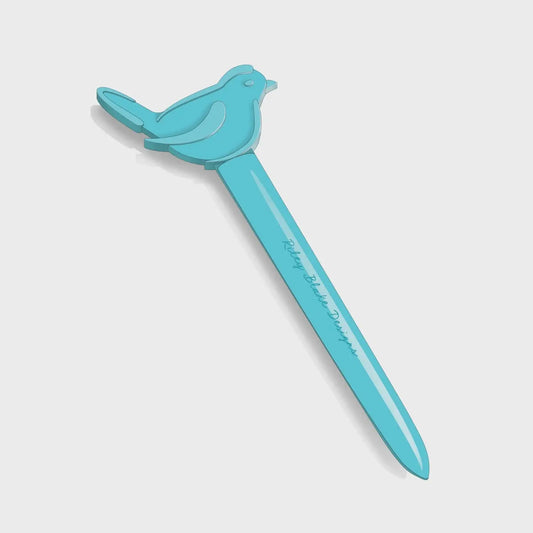 Turquoise bird point turner for sewing on a light gray background