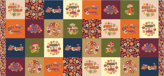 Patchwork pattern with colorful text and floral designs on a multicolored background