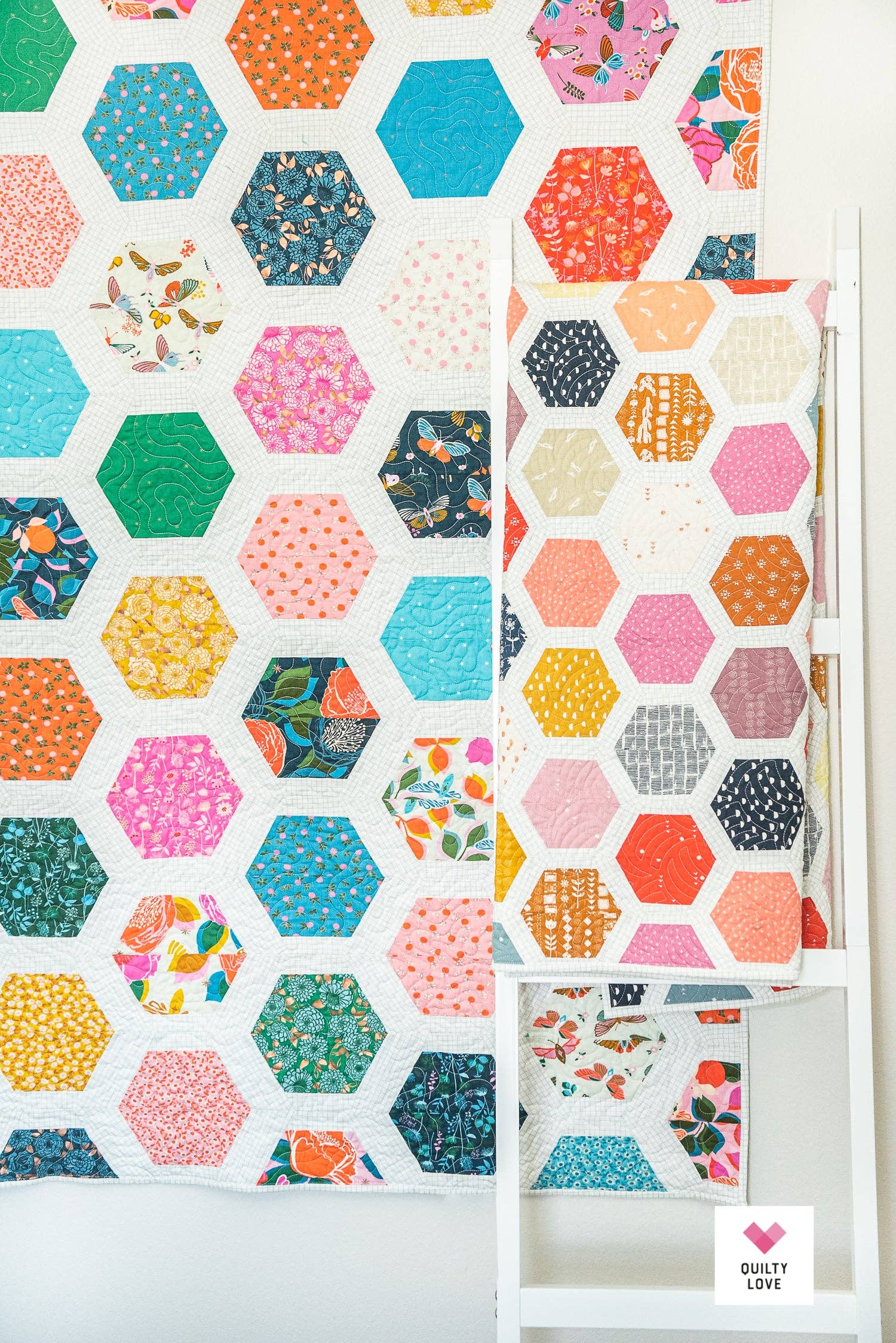 Hexagonal patterned fabric panels on a white background