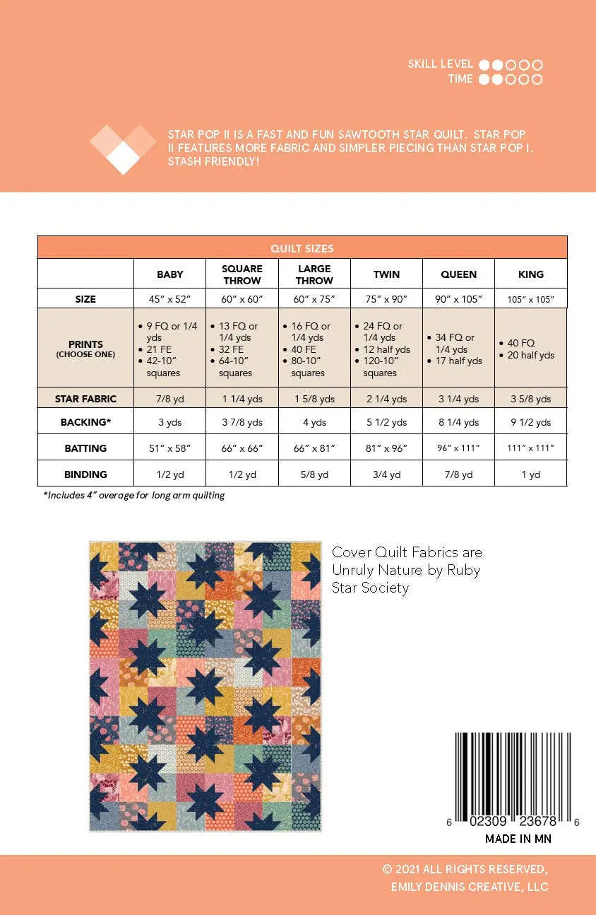 Quilt pattern book with fabric requirements and a colorful quilt illustration on an orange background.