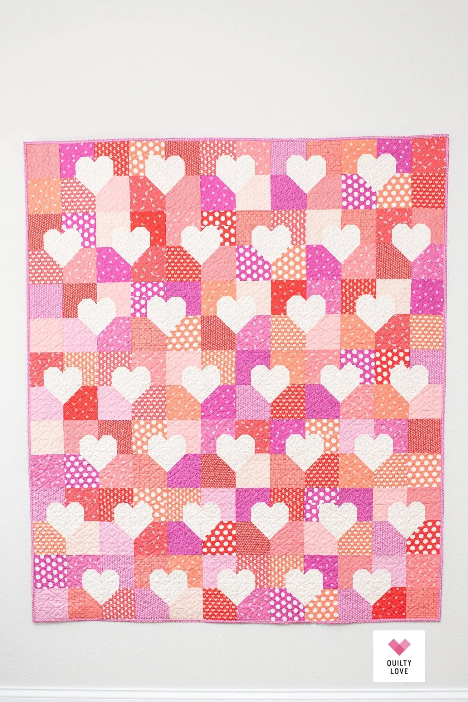 Quilt with heart pattern on a white background