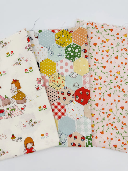 Three fabric swatches with different patterns on a white background