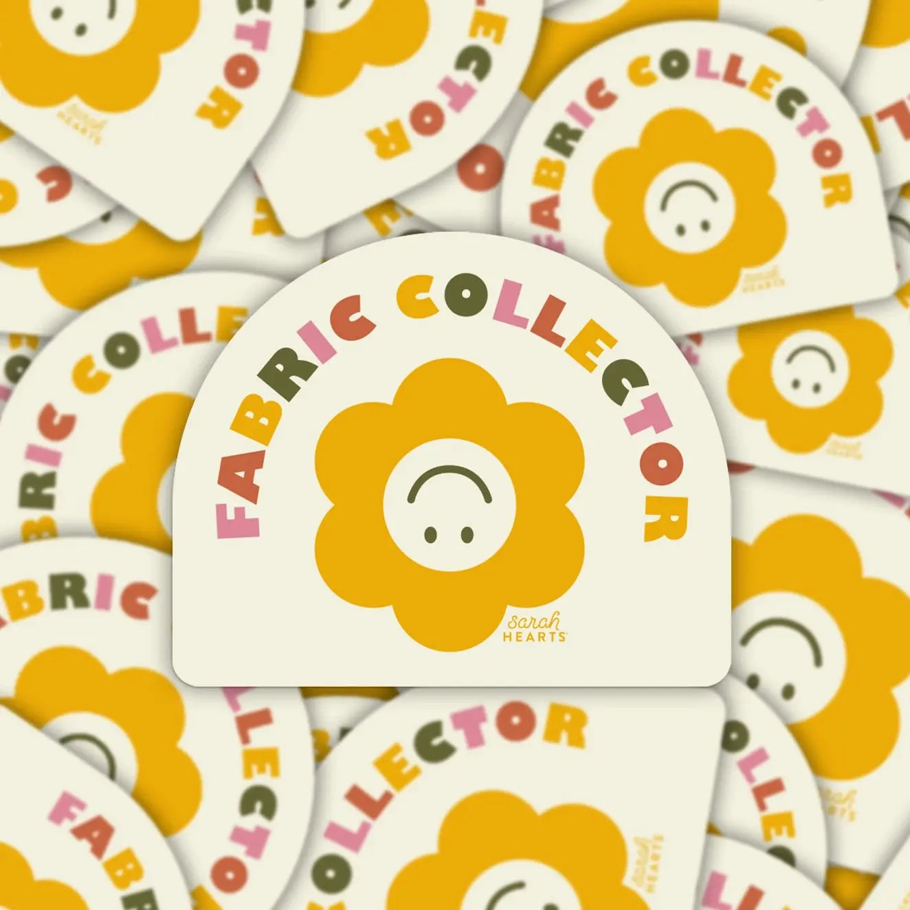 Stack of 'Fabric Collector' coasters with a floral design and text.