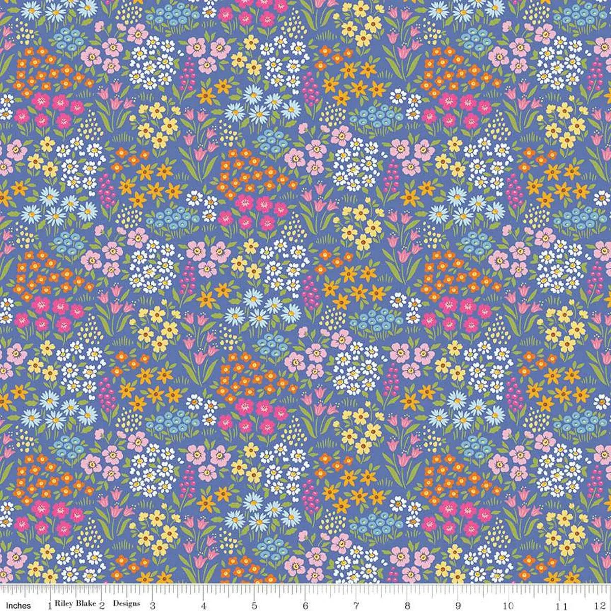 Colorful floral pattern on a periwinkle background with a fabric ruler at the bottom.