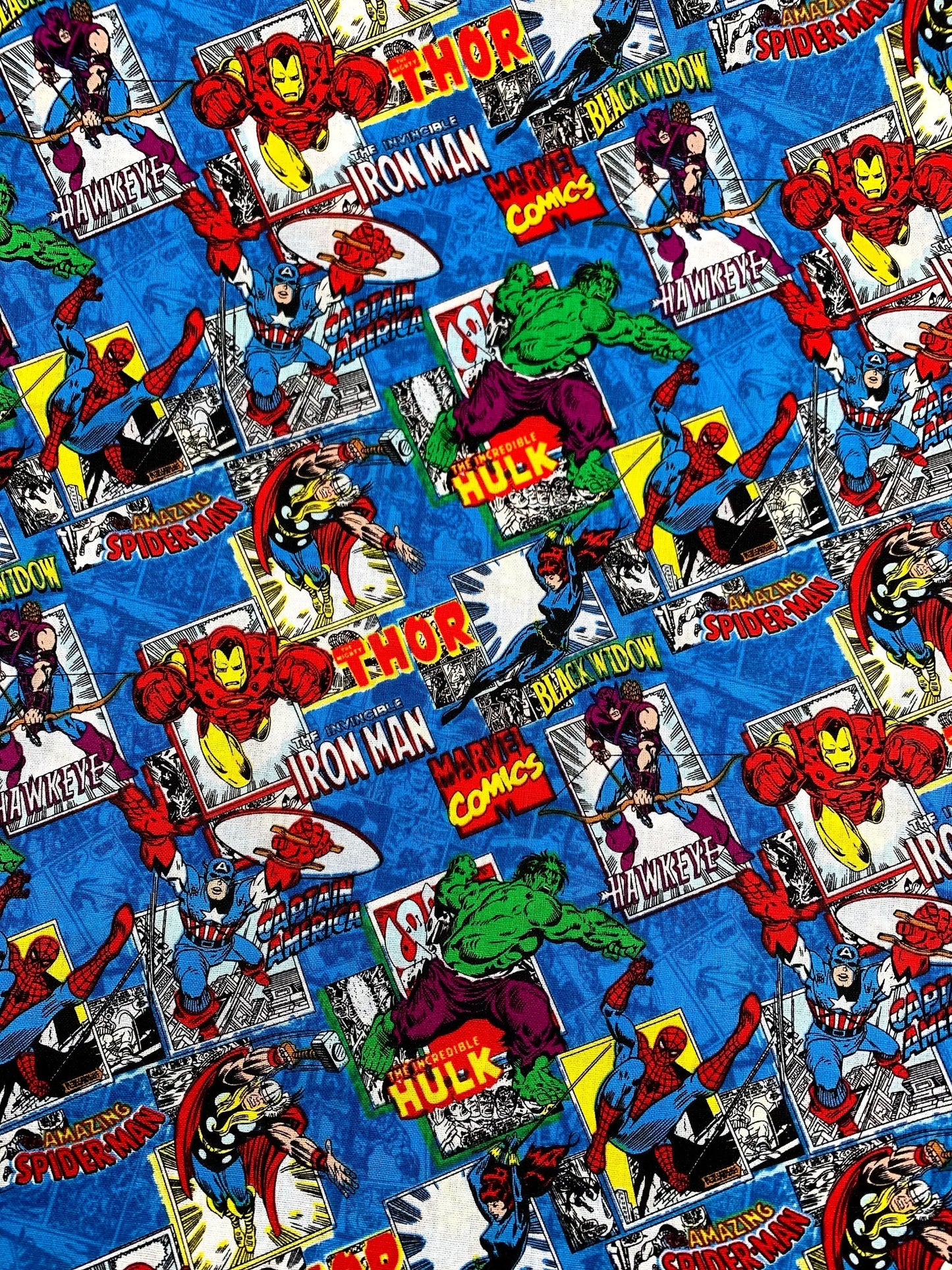 Marvel superhero fabric with Iron Man, Hulk, Thor, and Spider-Man on a blue background.
