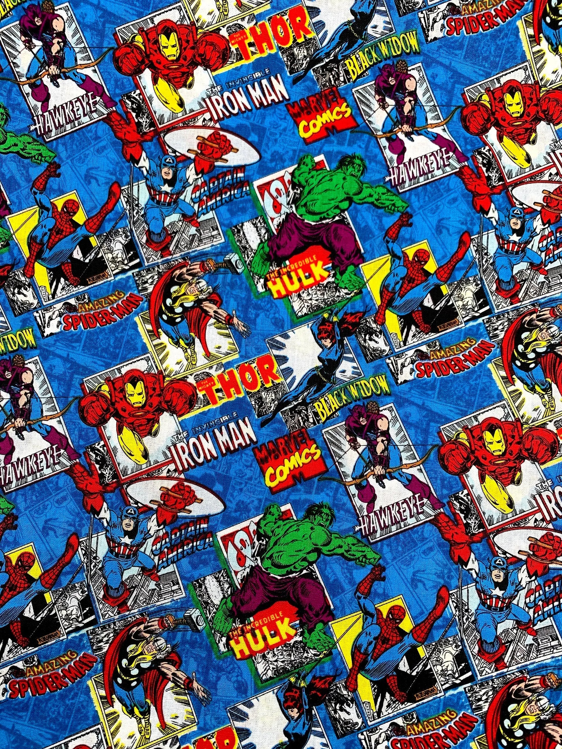 Marvel superhero fabric with Iron Man, Hulk, Thor, and Spider-Man on a blue background.