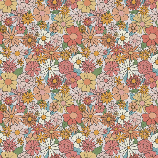 Colorful floral pattern with various flowers on a white background. Fabric is called Besties Floral Cotton Fabric by Riley Blake Designs